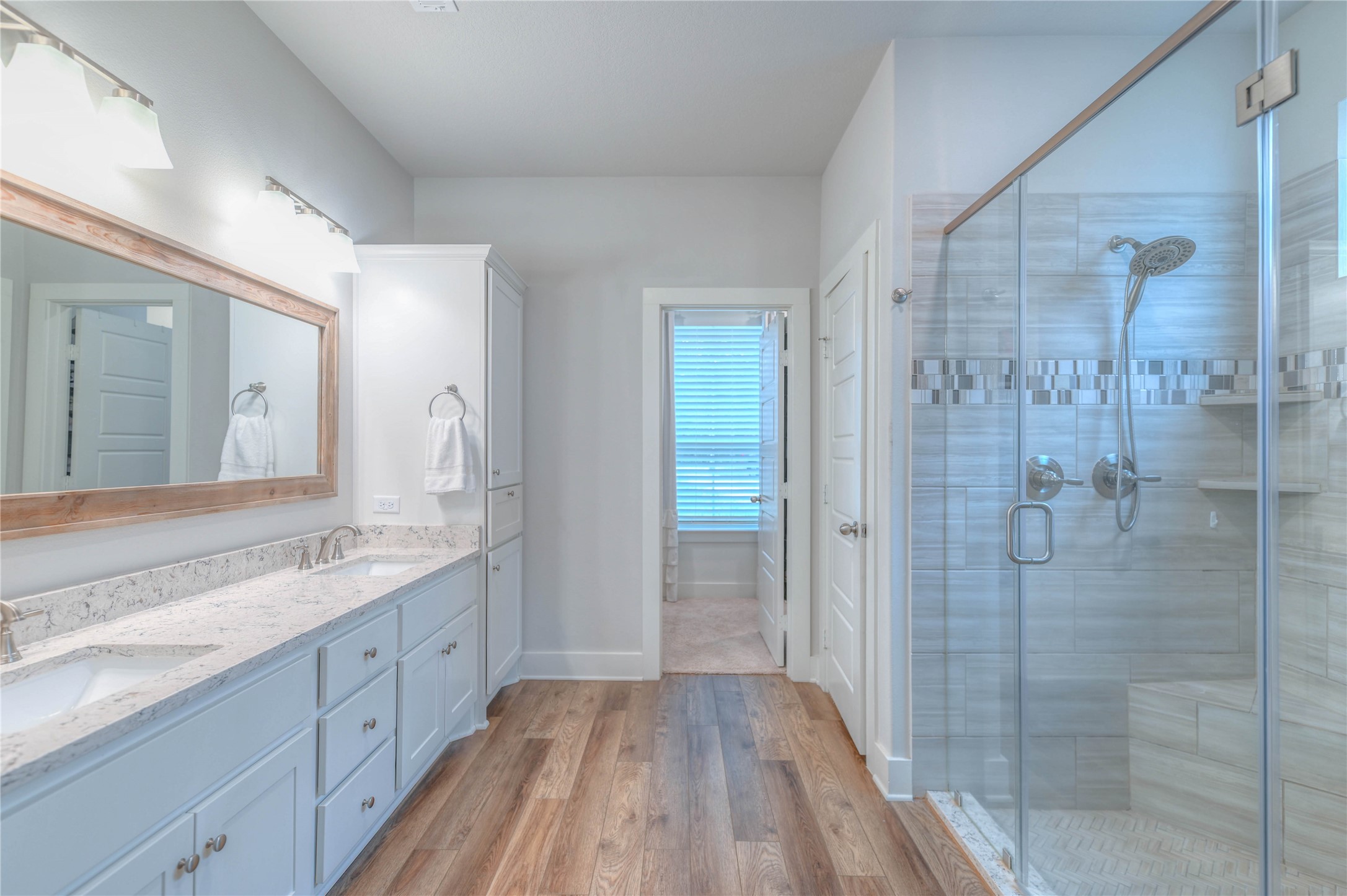 786 Farm To Market 230, Unit C Trinity, TX 75862 - Photo 19 of 41 a spacious bathroom with a granite countertop sink mirror and shower