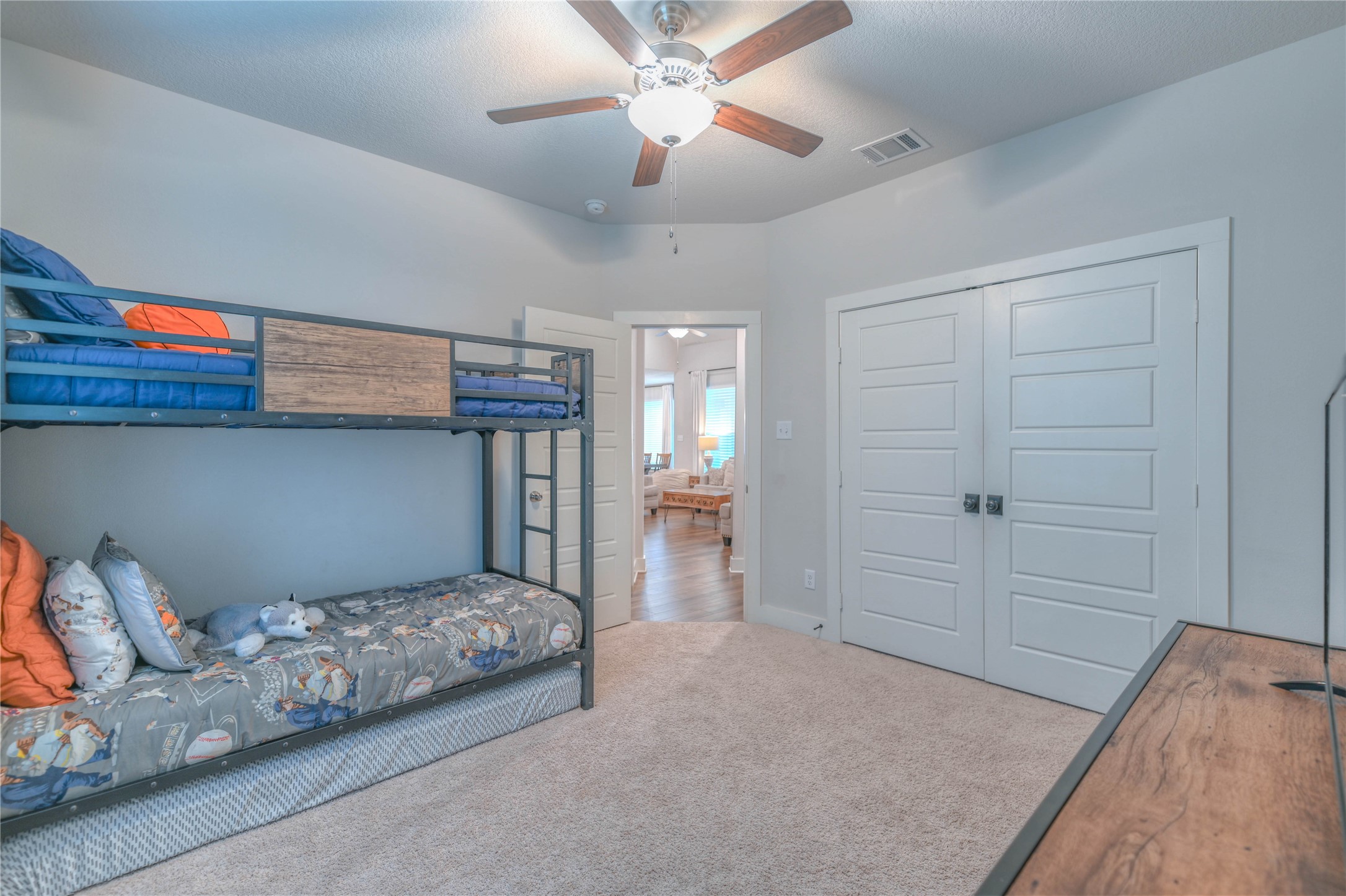 786 Farm To Market 230, Unit C Trinity, TX 75862 - Photo 24 of 41 a bedroom with a bed and a chandelier