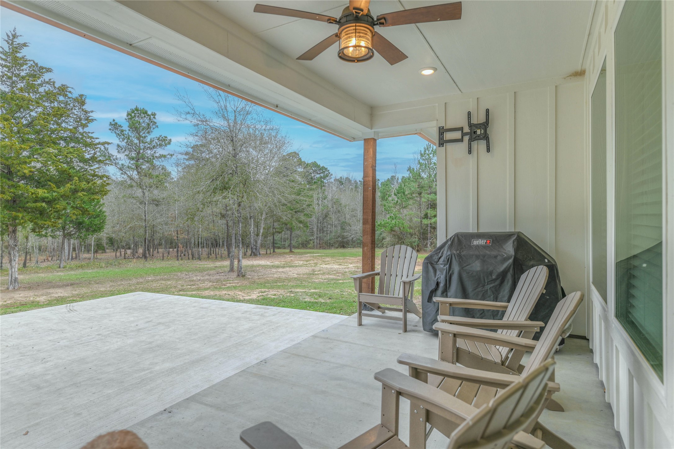 786 Farm To Market 230, Unit C Trinity, TX 75862 - Photo 28 of 41 a view of a porch with furniture and a yard