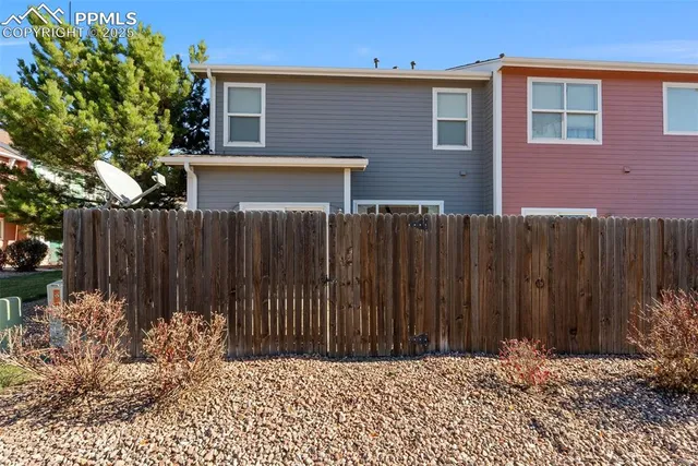 a house view with a garden space