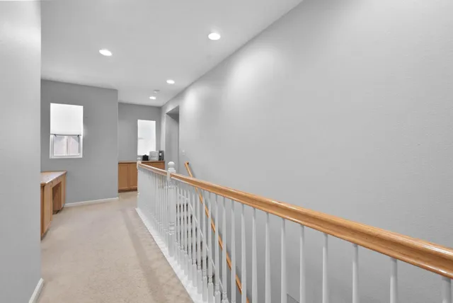 a view of hallway with stairs