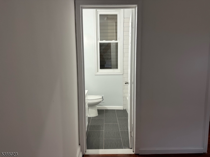 247 South 8th Street, Unit 1 Newark, NJ 07103 - Photo 4 of 13 a bathroom with a toilet