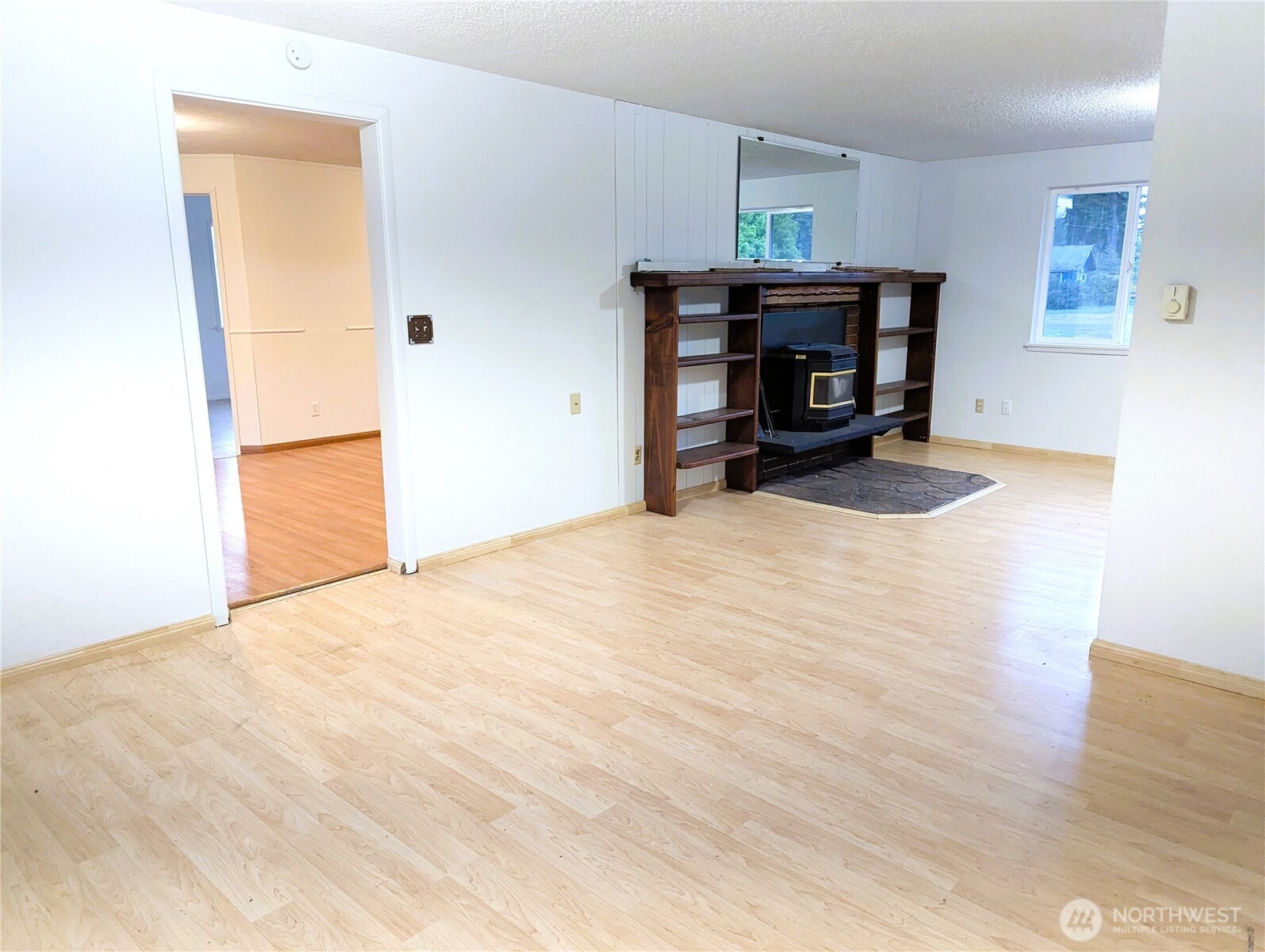 8927 178th Avenue Southwest Rochester, WA 98579 - Photo 26 of 38 a living room with furniture and a dining table