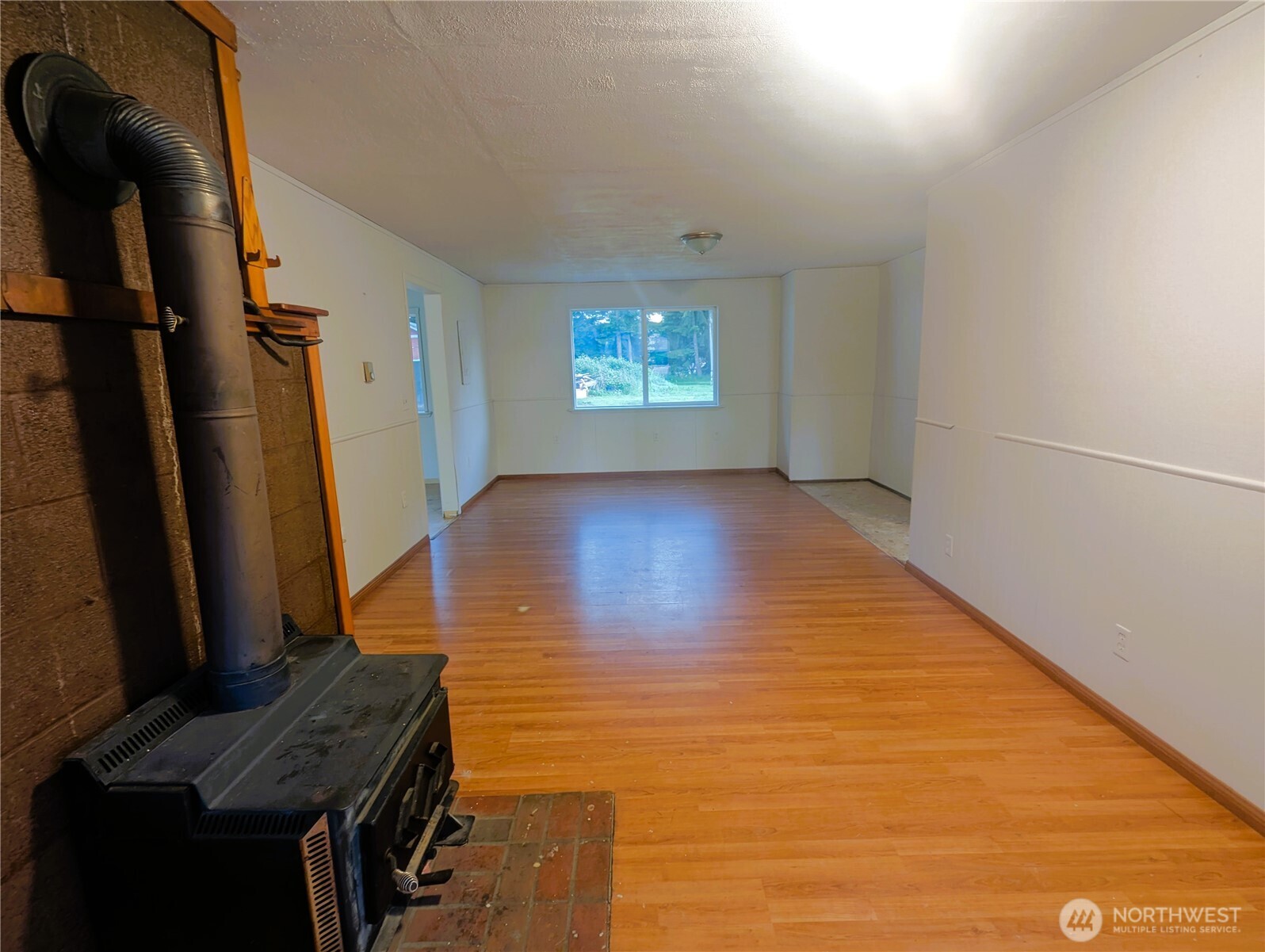 8927 178th Avenue Southwest Rochester, WA 98579 - Photo 33 of 38 a view of a workspace with furniture and a window