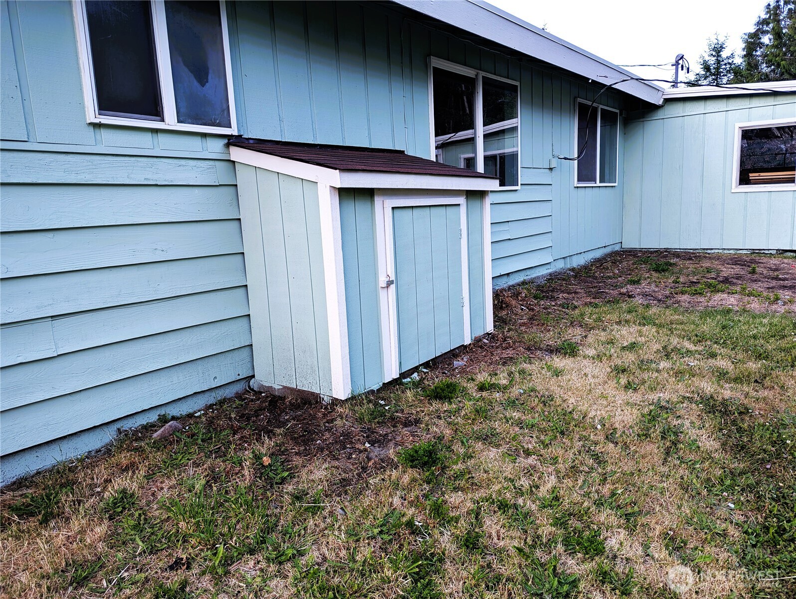 8927 178th Avenue Southwest Rochester, WA 98579 - Photo 34 of 38 a view of backyard of house