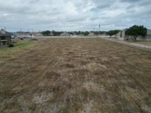 7410 Miller Road Rowlett, TX 75088 - Photo 2 of 5 a view of a lake with houses in the back