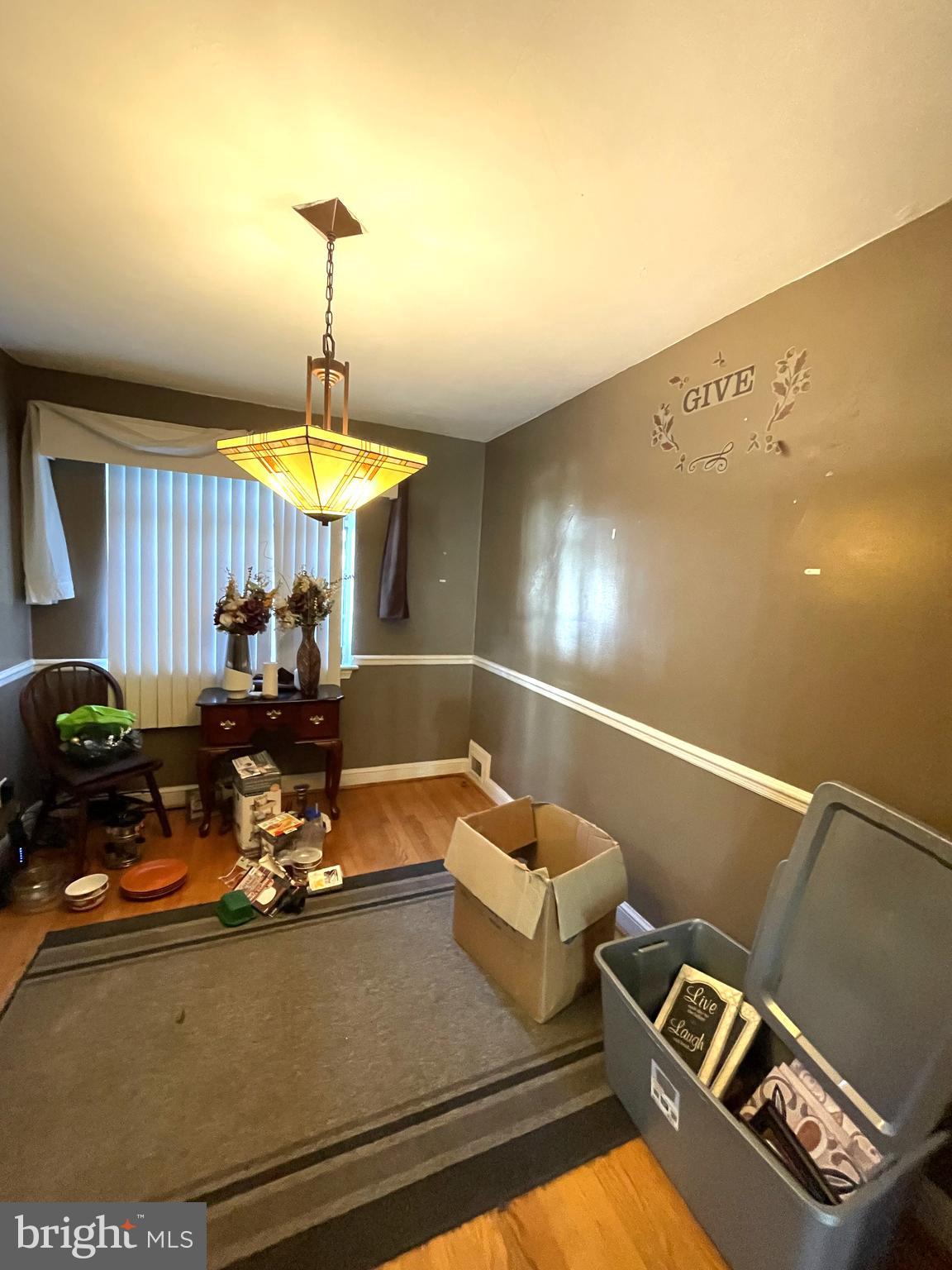 3018 M Place Southeast Washington, DC 20019 - Photo 5 of 9 a view of a room with furniture and chandelier