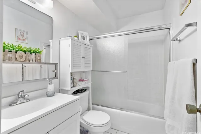 a bathroom with a sink vanity and a mirror