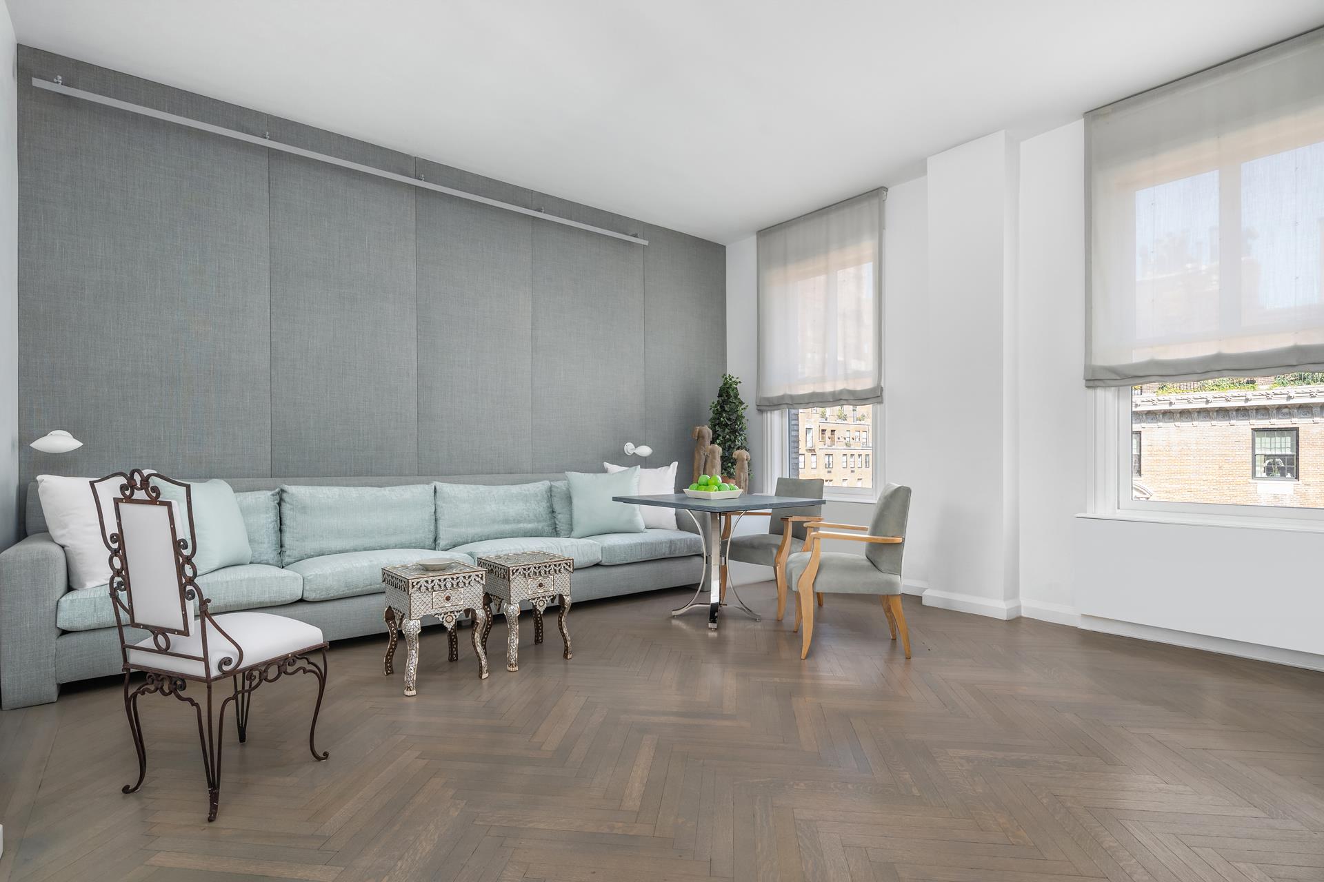 755 Park Avenue, Unit PHA Manhattan, NY 10021 - Photo 4 of 16 a living room with furniture and a window