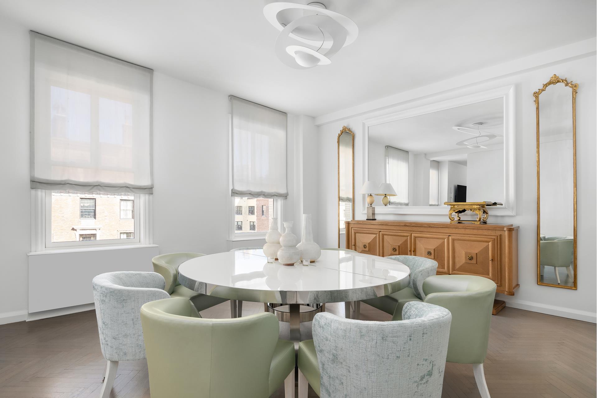 755 Park Avenue, Unit PHA Manhattan, NY 10021 - Photo 6 of 16 a dining room with furniture and window