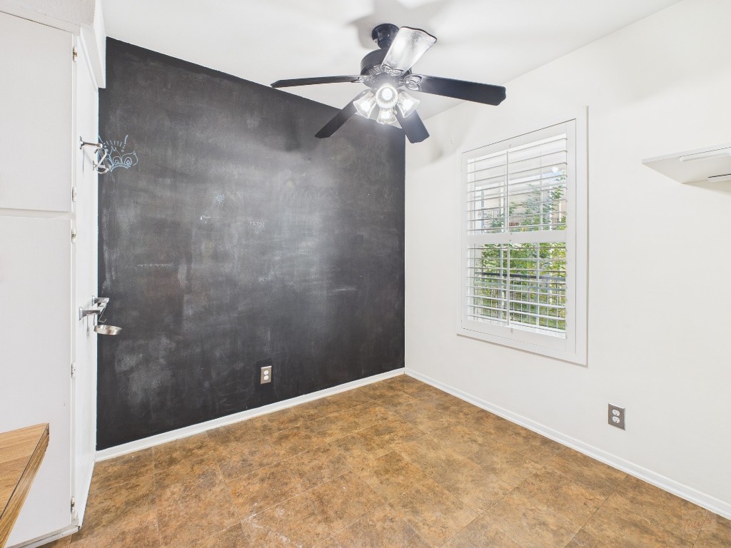 910 Duncan Lane, Unit 26 Austin, TX 78705 - Photo 15 of 31 a view of an empty room with a window