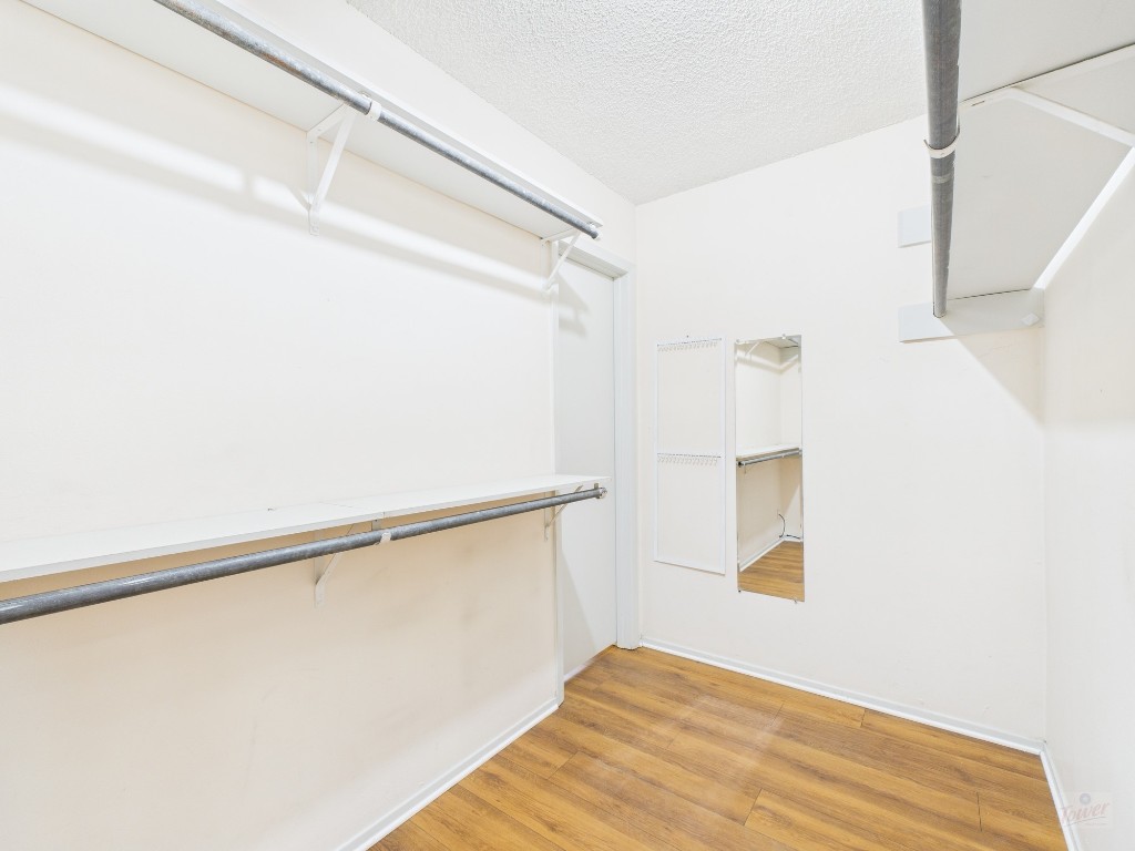 910 Duncan Lane, Unit 26 Austin, TX 78705 - Photo 6 of 31 a view of a walk in closet