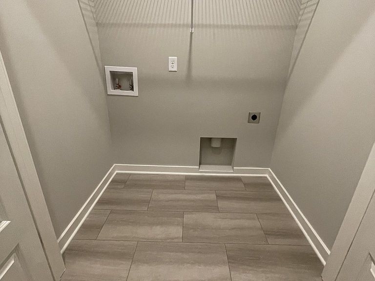 702 Mickelson Way, Unit 702 Lebanon, TN 37087 - Photo 17 of 17 a view of empty room with wooden floor