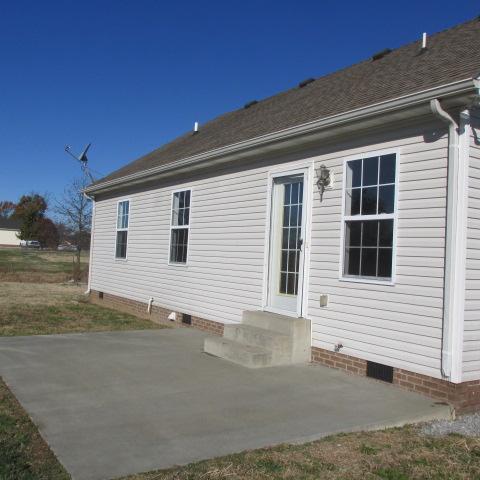 2765 Kinneys Road Cedar Hill, TN 37032 - Photo 15 of 16 View of back which has patio and also roof looks recent