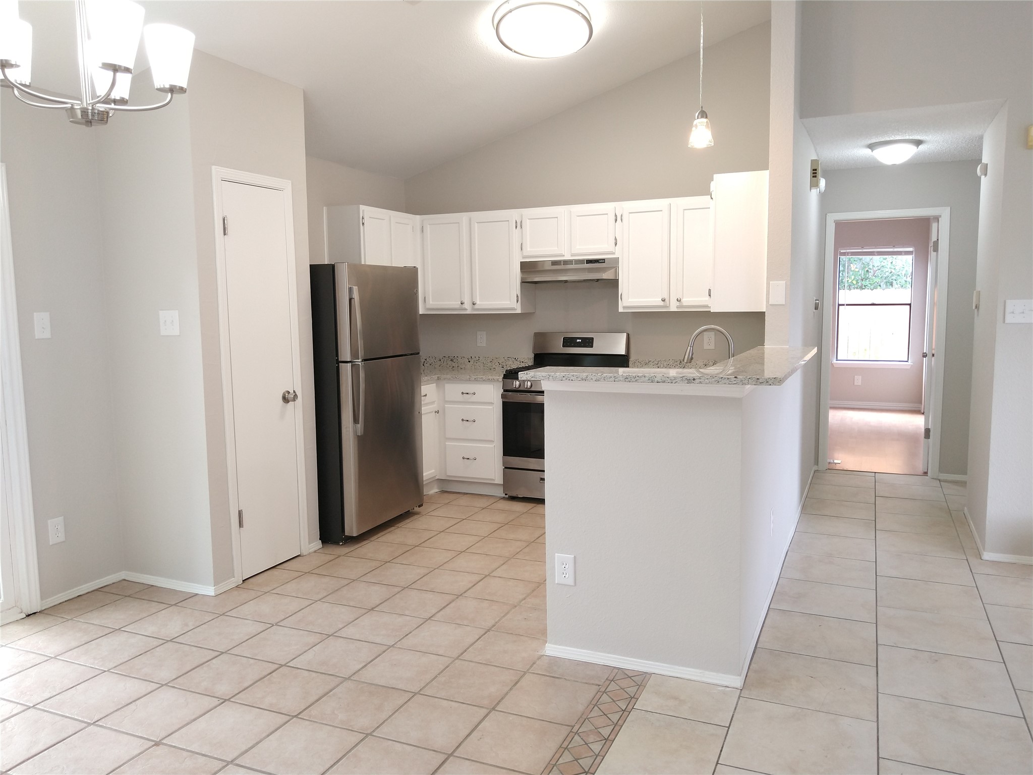 1813 Laurel Path Round Rock, TX 78664 - Photo 21 of 35 Culinary adventures await in this kitchen featuring abundant cabinet space and sleek stainless steel appliances.
