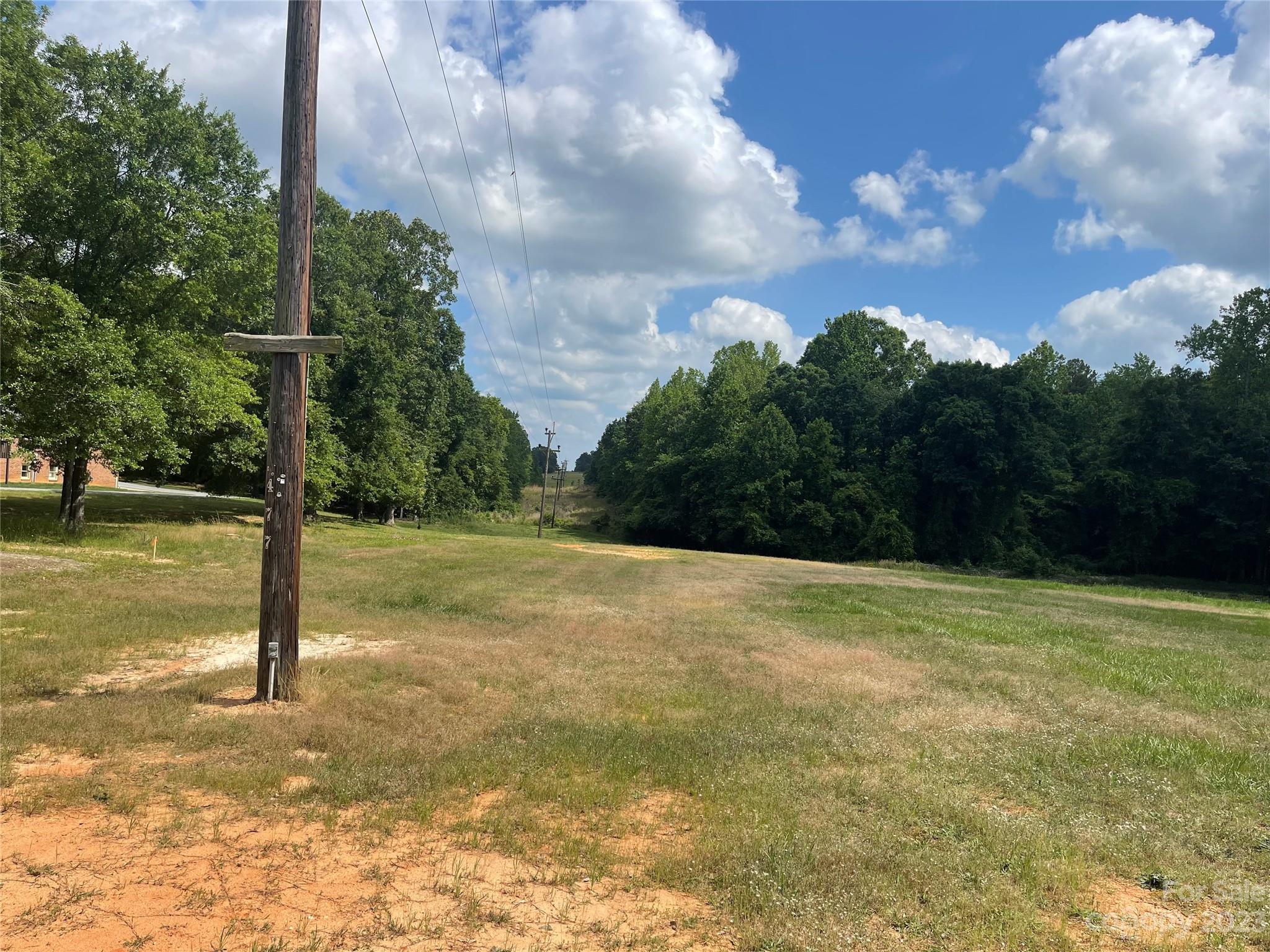 1375 Williams Road Fort Mill, SC 29715 - Photo 4 of 13 a view of a yard with basketball court
