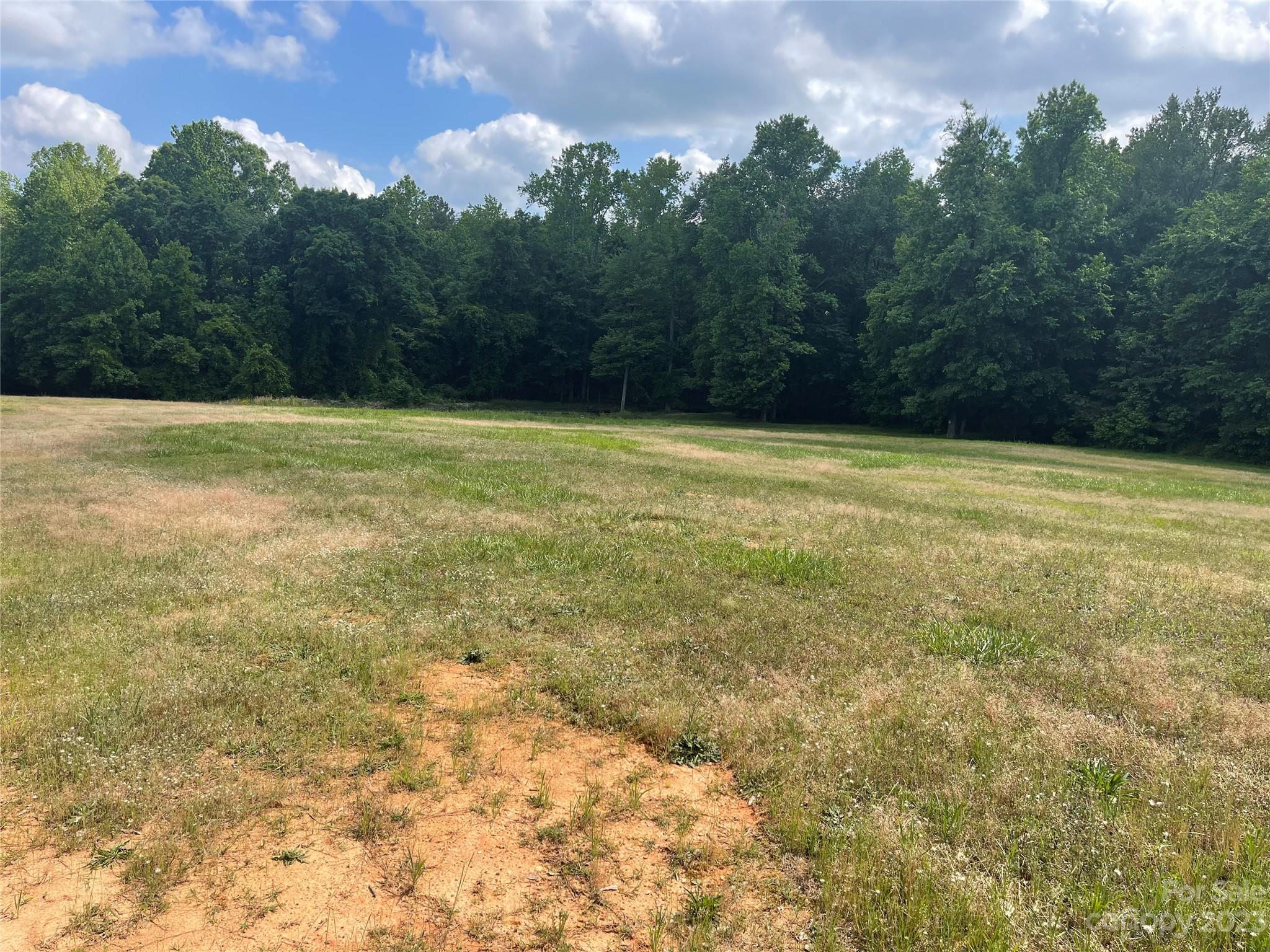 1375 Williams Road Fort Mill, SC 29715 - Photo 5 of 13 a view of a yard with a house in the background