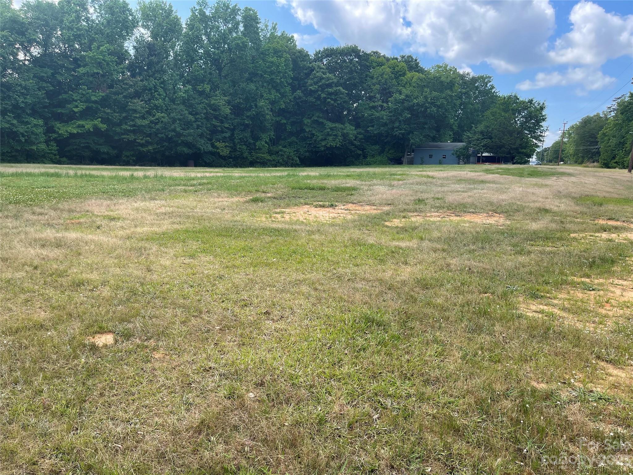 1375 Williams Road Fort Mill, SC 29715 - Photo 7 of 13 a view of a field with an trees
