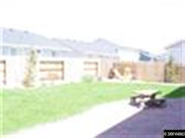 8983 Mahon Drive Reno, NV 89506 - Photo 7 of 8 a view of a yard