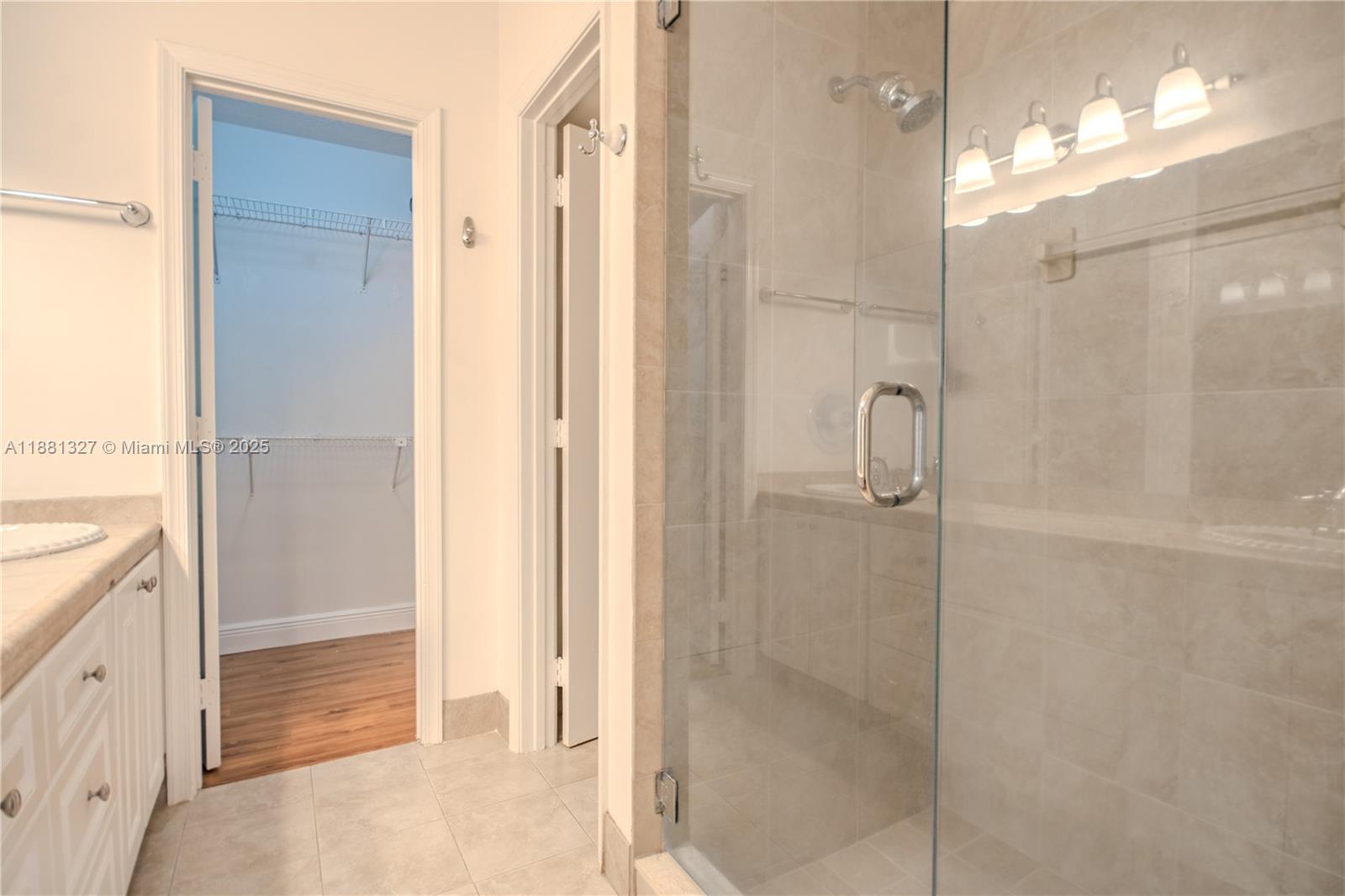 7652 Pinewalk Drive South, Unit 139 Margate, FL 33063 - Photo 18 of 26 a bathroom with a shower