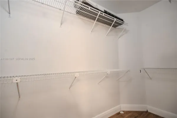 a view of a room with racks on the wall