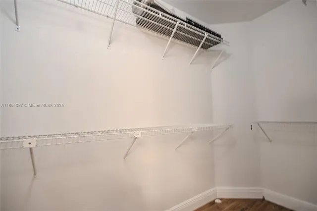 a view of a room with racks on the wall