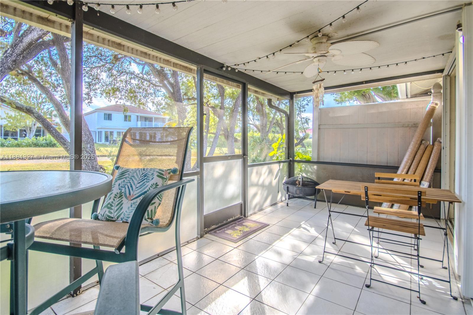 7652 Pinewalk Drive South, Unit 139 Margate, FL 33063 - Photo 21 of 26 a living room with a large window