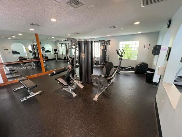 a view of a room with gym equipment