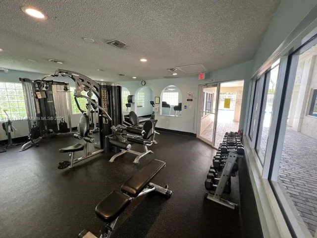 a view of a room with gym equipment