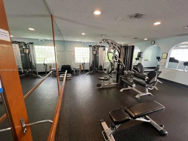 a view of a room with gym equipment
