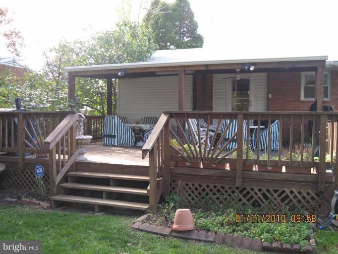 7301 Loisdale Road Springfield, VA 22150 - Photo 15 of 19 Large covered deck with ceiling fan