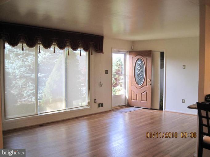 7301 Loisdale Road Springfield, VA 22150 - Photo 5 of 19 Main Level Family Room and Foyer