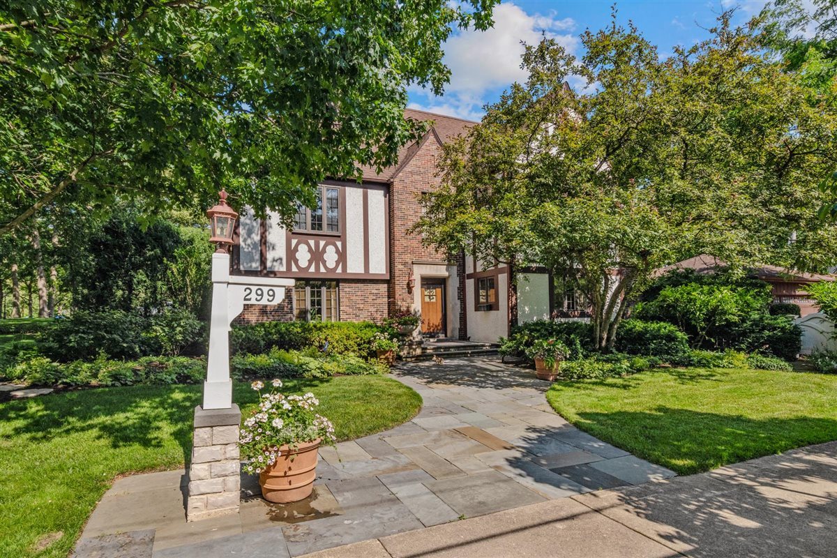 a sign board with yard in front of it