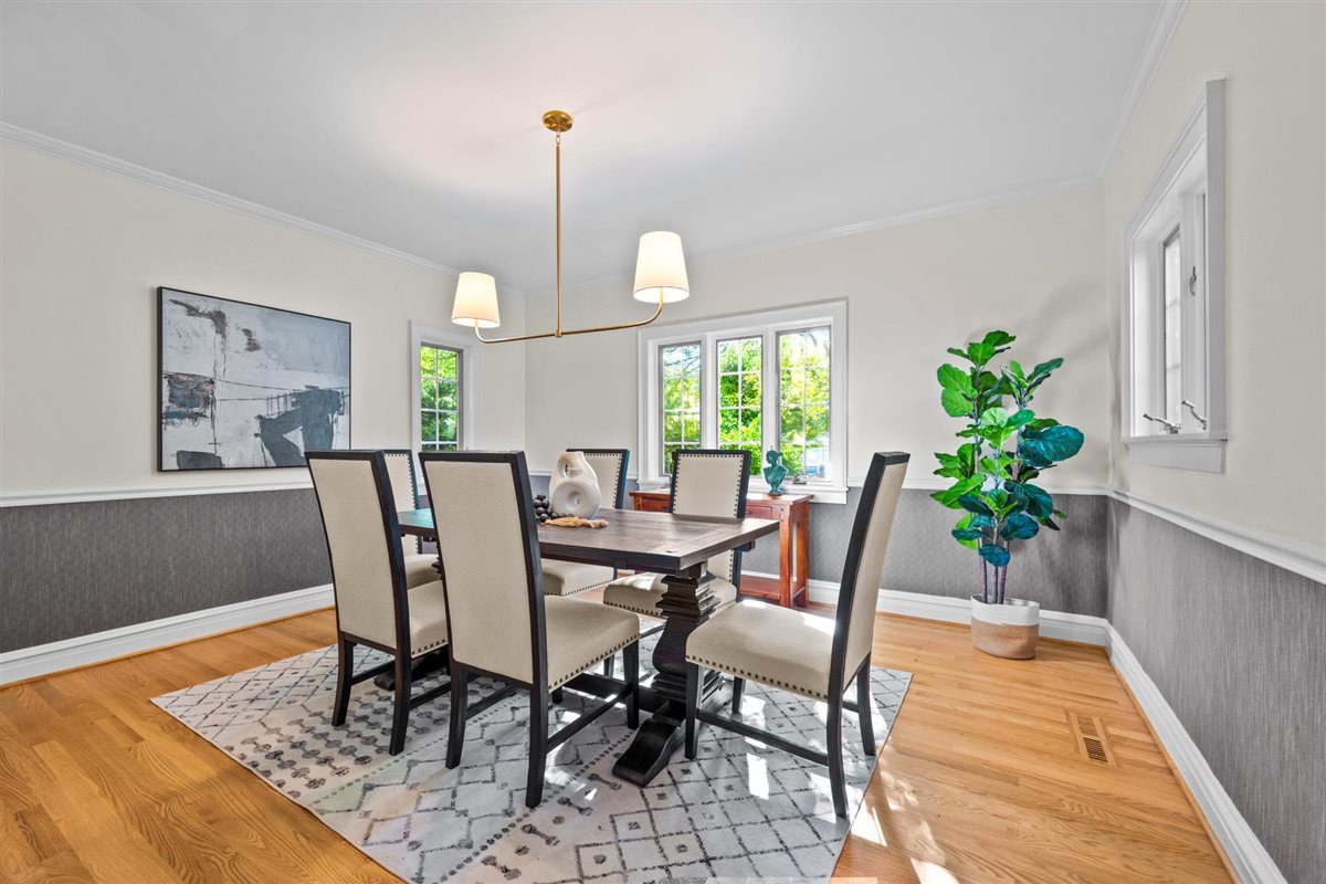 299 Vernon Avenue Glencoe, IL 60022 - Photo 13 of 42 a view of a dining room with furniture window and wooden floor