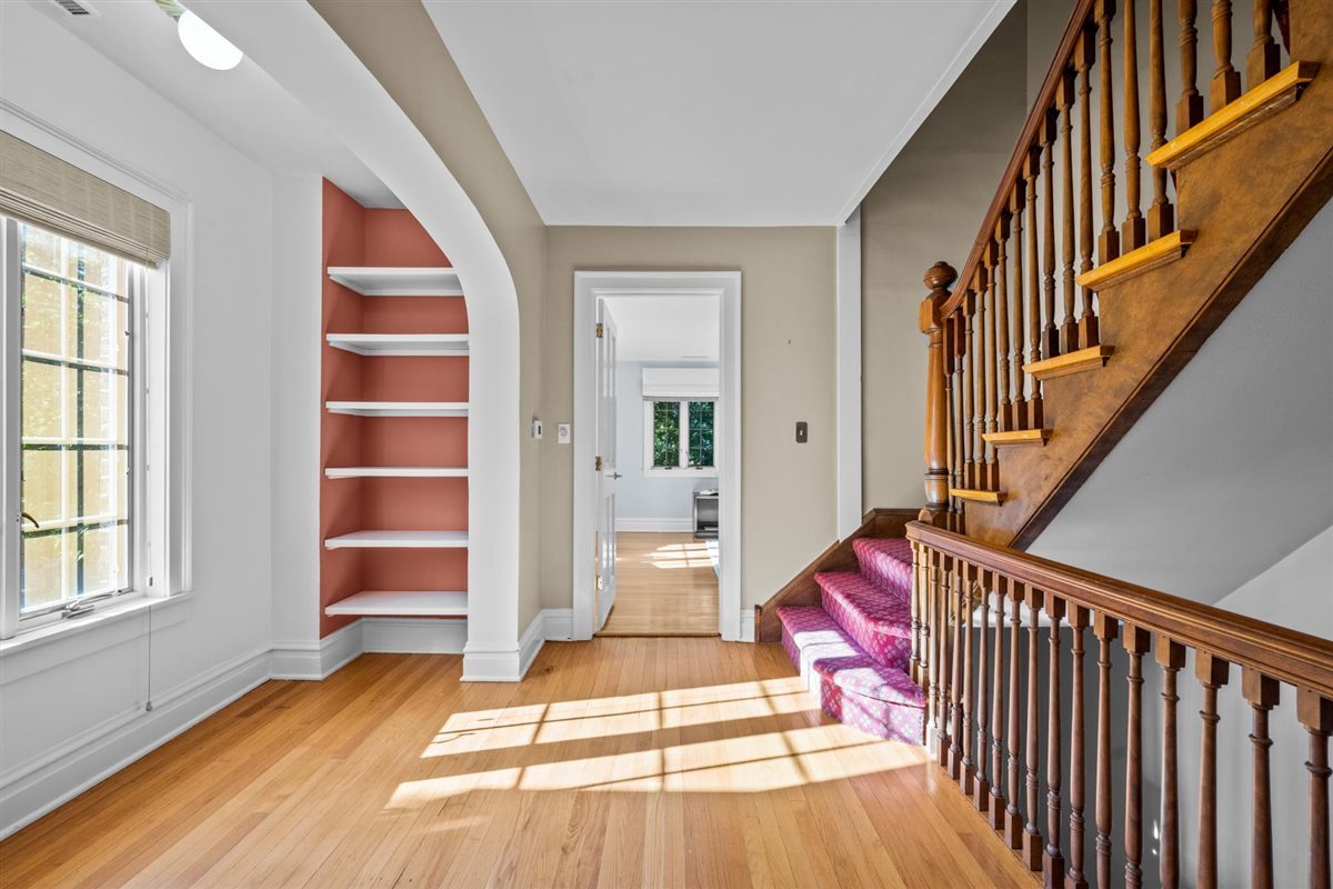 299 Vernon Avenue Glencoe, IL 60022 - Photo 19 of 42 a view of an entryway with wooden floor and door