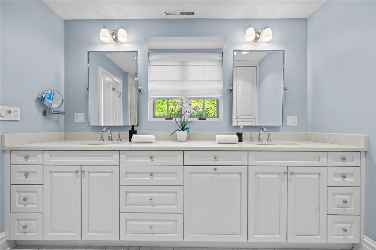 299 Vernon Avenue Glencoe, IL 60022 - Photo 22 of 42 a bathroom with white cabinets and sink