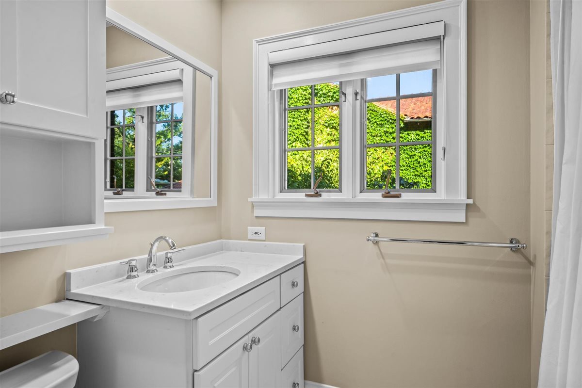 299 Vernon Avenue Glencoe, IL 60022 - Photo 29 of 42 a bathroom with a sink and a vanity
