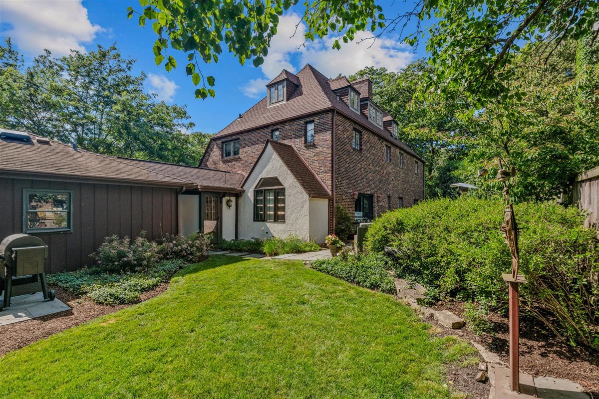 299 Vernon Avenue Glencoe, IL 60022 - Photo 33 of 42 a front view of a house with garden