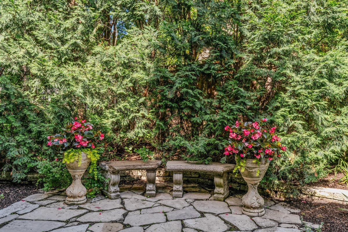 299 Vernon Avenue Glencoe, IL 60022 - Photo 34 of 42 a view of a potted flower in a yard