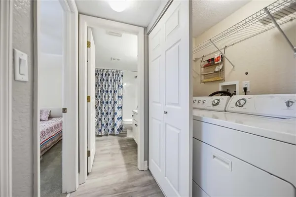 a bathroom with a granite countertop sink mirror and double