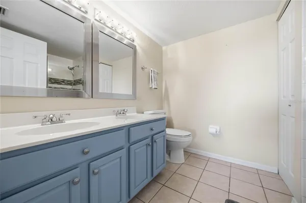 a view of a chairs and tables in the balcony