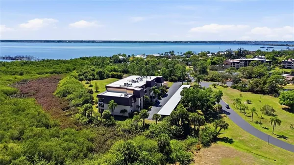 a view of a lake with a building in the back