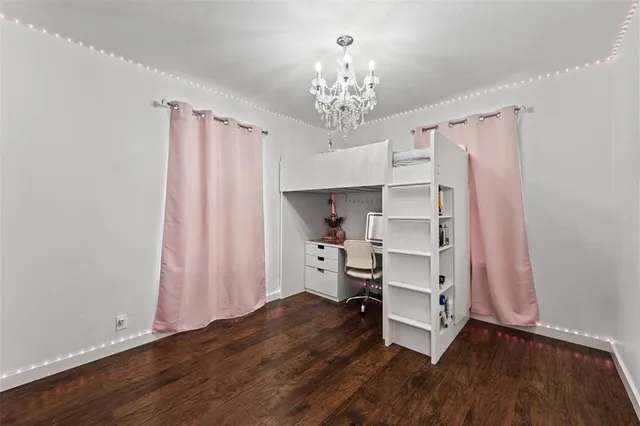 a bathroom with a shower sink and mirror