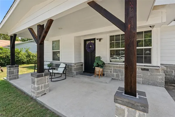a view of a house with swimming pool and a yard