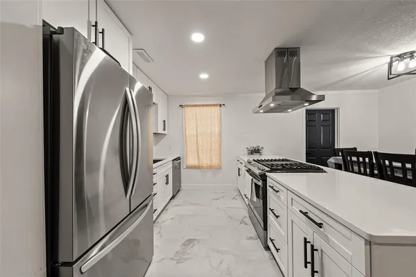a view of a dining room with furniture