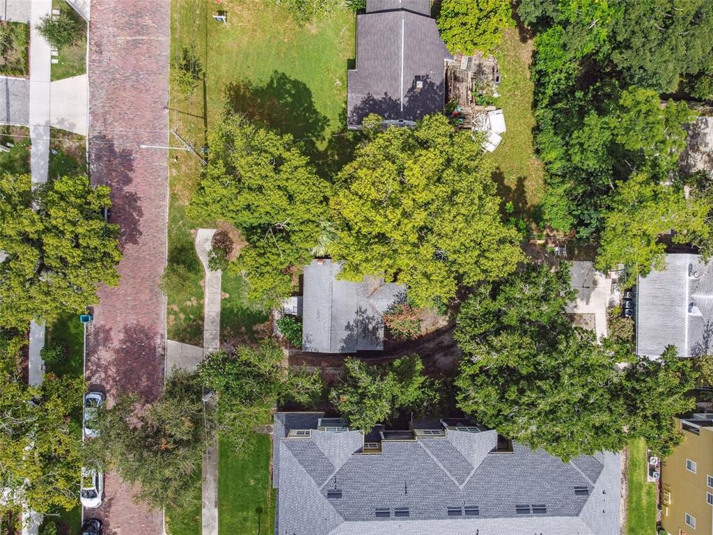 31 West Harding Street Orlando, FL 32806 - Photo 3 of 41 an aerial view of a house with a yard and garden
