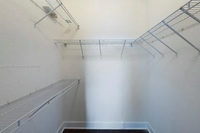 a view of small space with racks on the wall