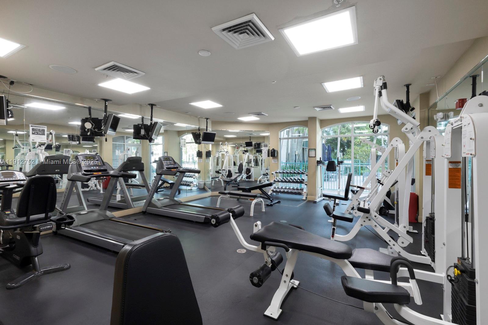 6001 Southwest 70th Street, Unit 139 South Miami, FL 33143 - Photo 25 of 29 a view of a room with gym equipment