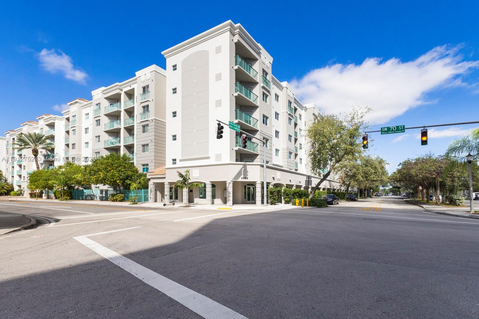 6001 Southwest 70th Street, Unit 139 South Miami, FL 33143 - Photo 29 of 29 a view of a building with a street
