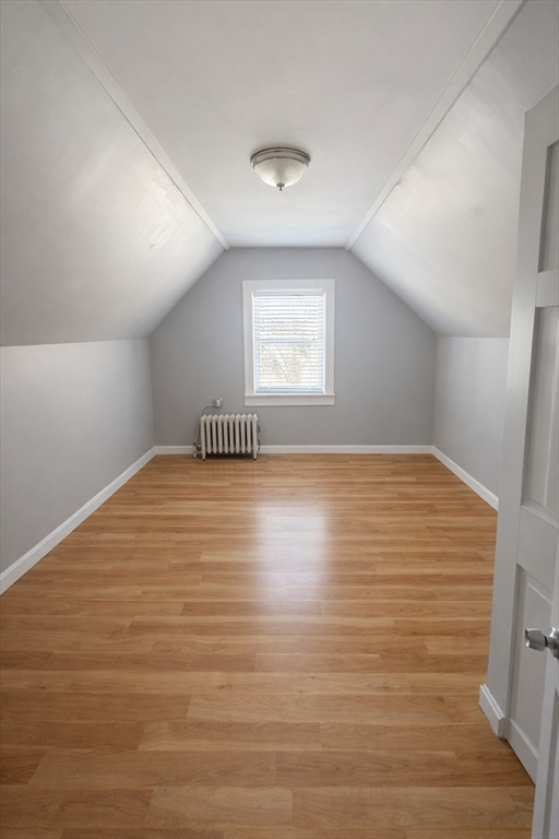 67 Prospect Street Somerville, MA 02143 - Photo 5 of 11 a view of empty room with wooden floor